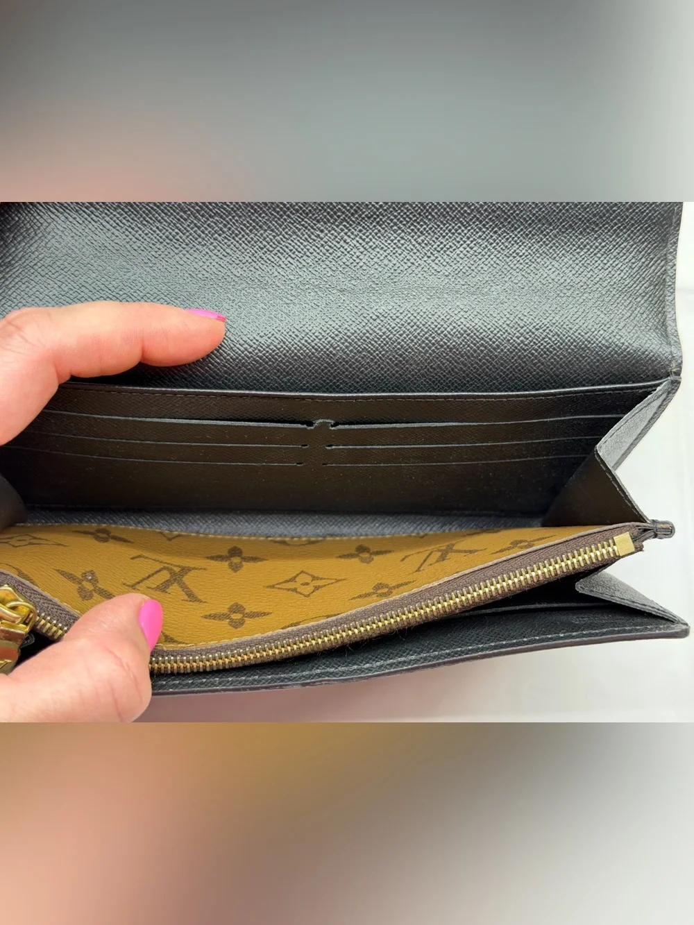 Louis Vuitton Sarah wallet in reverse monogram